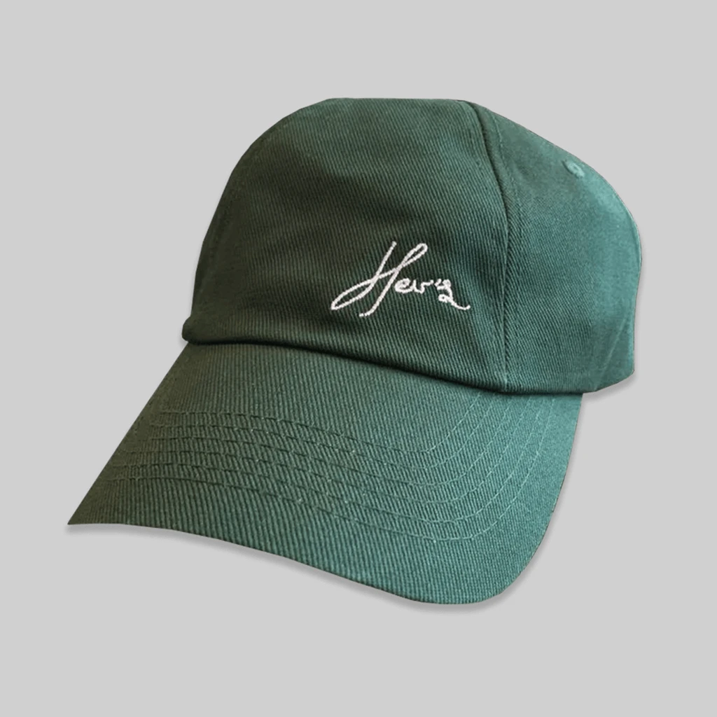 Her's Script Dino Green Dad Hat New Merch 1 Her's Script Dino Green Dad Hat New Merch