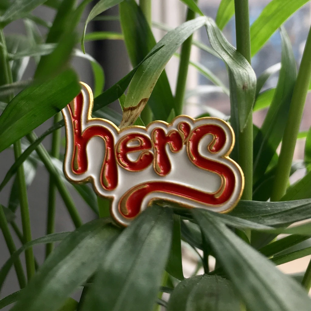 New Merch Her's Logo Pin 2 New Merch Her's Logo Pin